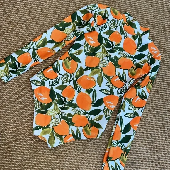Mott50 One Piece Orange Print Swimsuit w/ Long Sleeves & UPF 50+